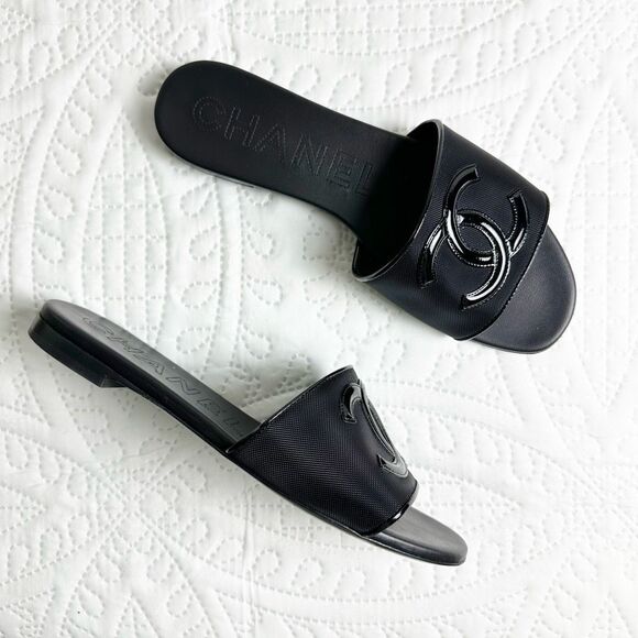 CHANEL Shoes - CHANEL Black Mesh Interlocking CC Slide Sandals Size 37.5 Leather Flat 2023